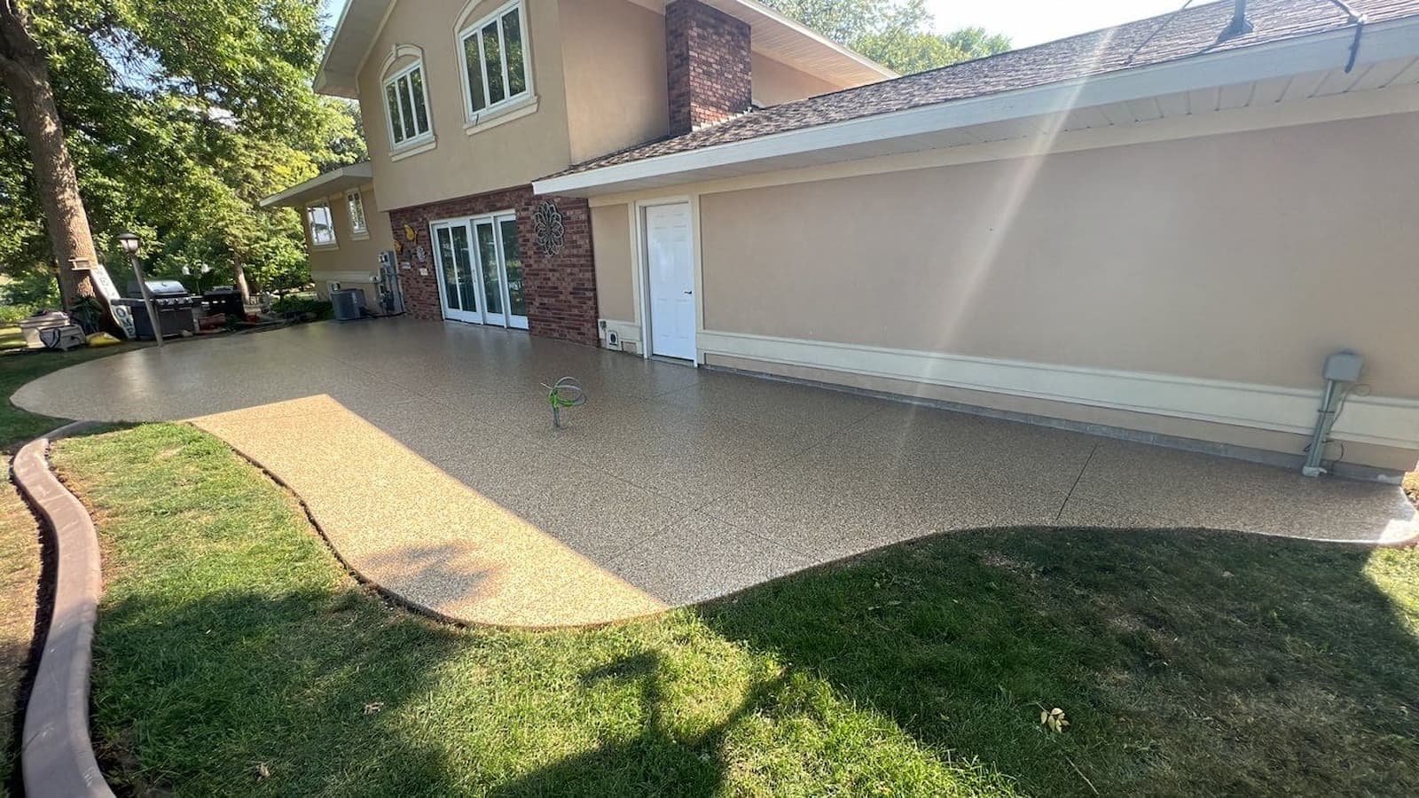 Boost Your Concrete's Lifespan: Why Polyurea Polyaspartic Coatings Are the Best Choice - exterior backyard patio coated